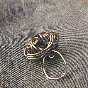 MMBM (man made by me) silver tone, adjustable ring. Size 7/8/9.